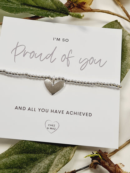 I'm so proud of you and all you have achieved - Silver plated charm bracelet & heart charm